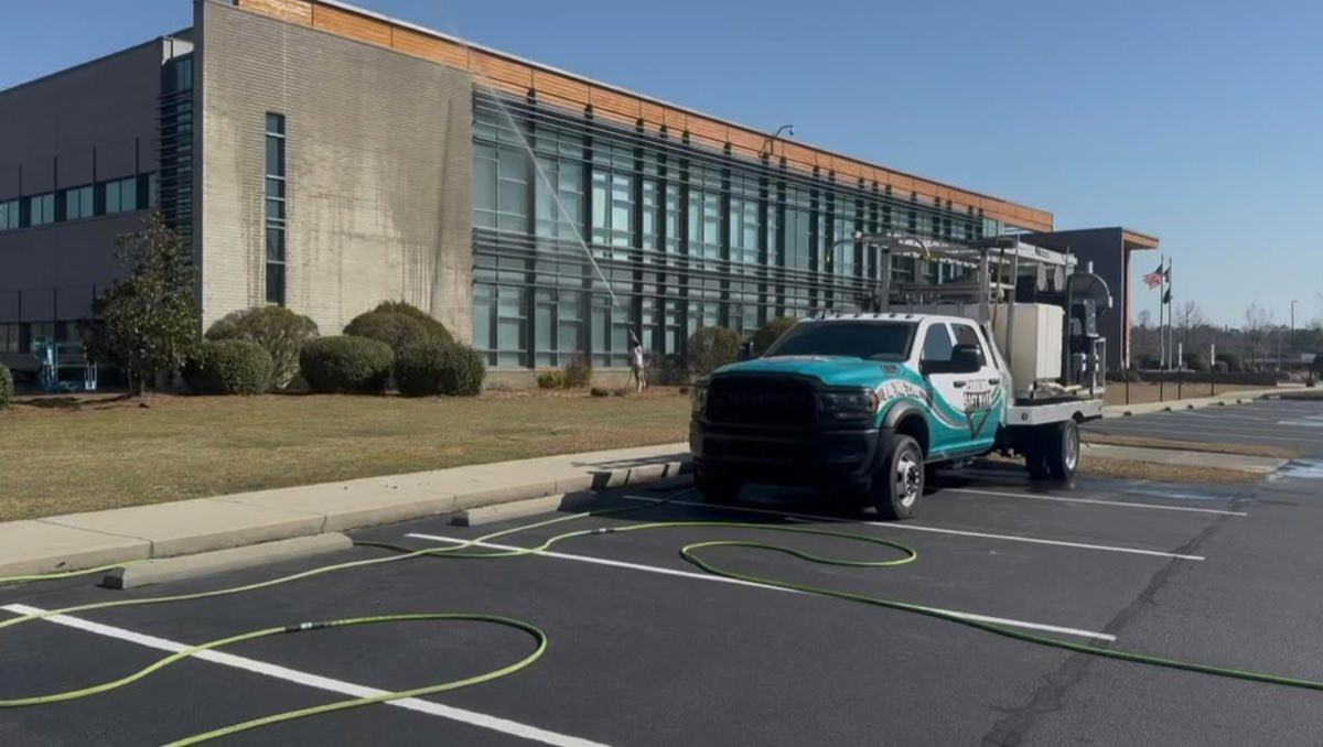 Soft washing the exterior of a commercial office building